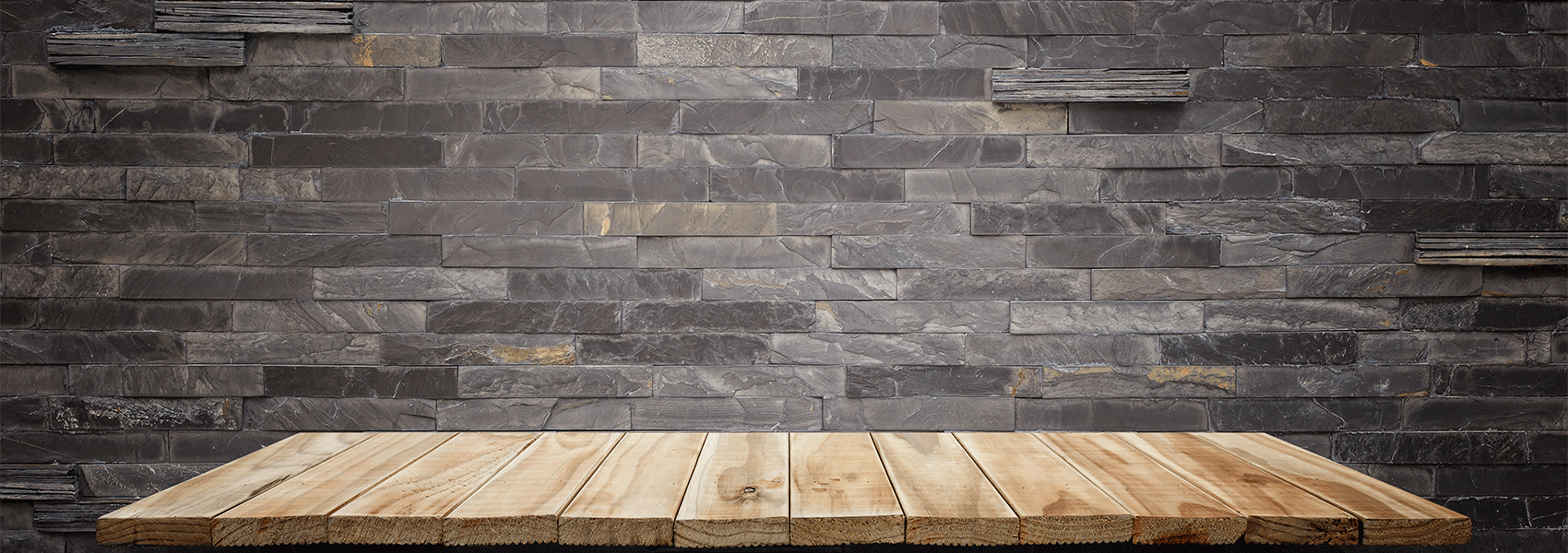 BANNER_0000s_0006_empty-wooden-shelves-stone-wall-background-product-display